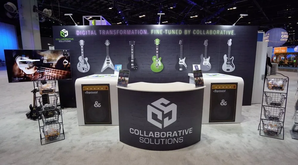 Rock and roll themed conference booth signage