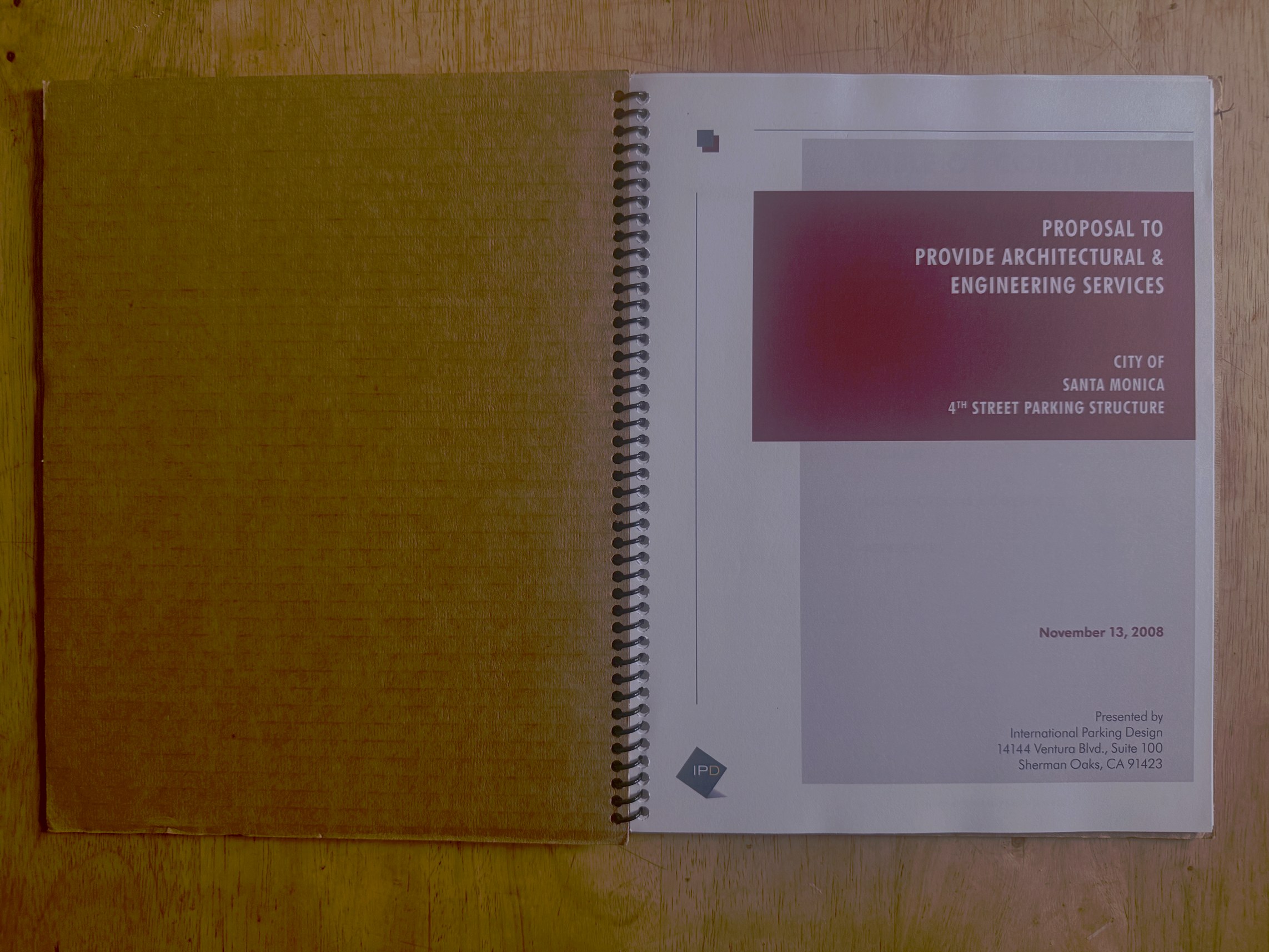 IPD proposal interior spread showing the Firm Profile and Statement and Philosophy sections